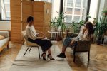 Woman in White Shirt Sitting on Chair, Therapist and Client