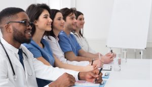 Medical Conference. Successful Young Interns Listening Lecture