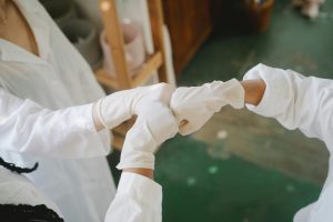 Nursing team fist bumps